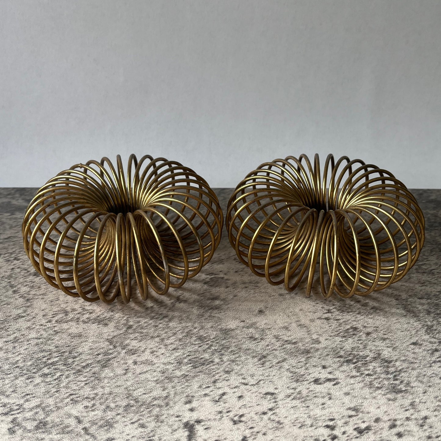 Pair of MCM Brass Unique Coil Expandable Candle Holders